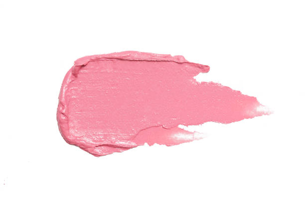 Pink ceamy makeup sample islated on white background. Decorative cosmetic smear.