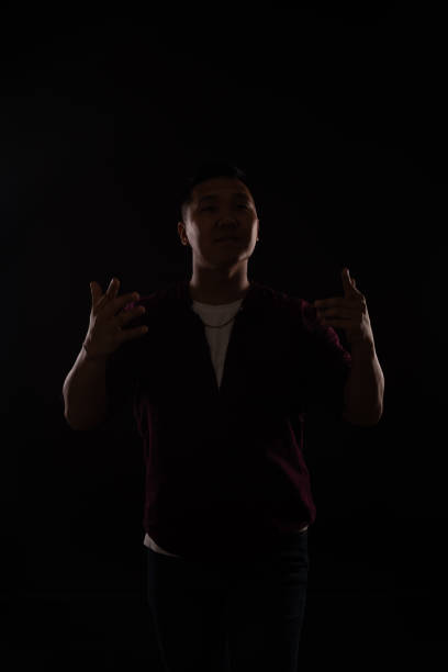 istock Asian man dancing to music song nice 1370550599