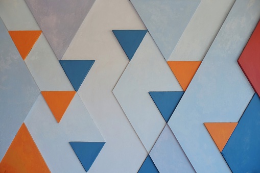 Wall with triangular decoration for decorative background.