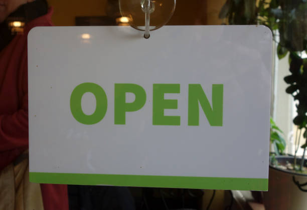 istock open sign and business hours 1370552702