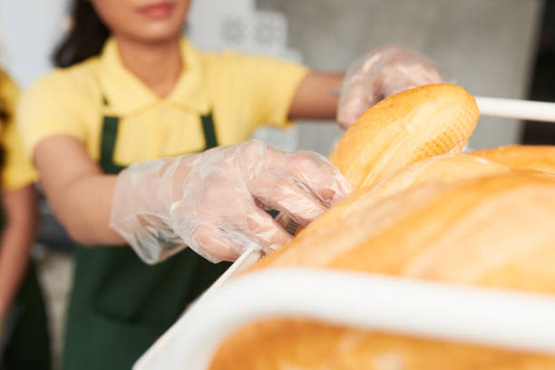 istock Vendor Choosing Bread for Sandwich 1370554588