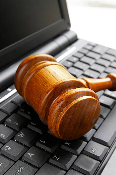istock Wooden gavel resting on pc keyboard 137055496