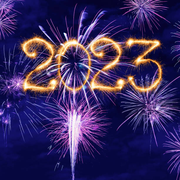 Sparkling New Year 2023 with fireworks stock photo