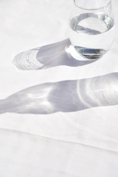 istock glass of water with reflection on white background 1370571028