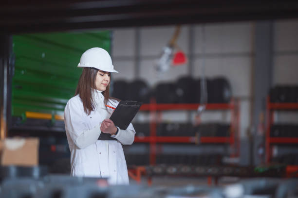 istock Car repair female engineer 1370572074