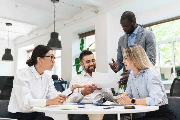 istock Multi-ethnic business people during meeting in modern office 1370572583