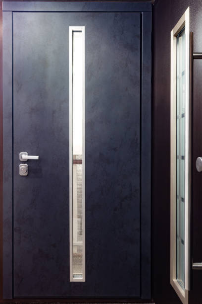 istock Entrance doors for sale in a specialized store. 1370573196