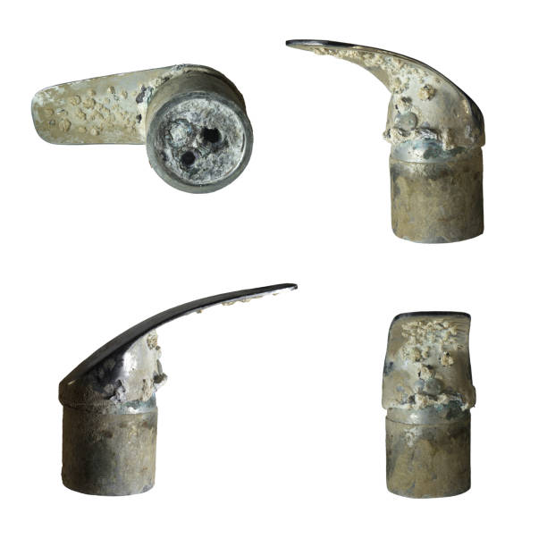 Water faucet destroyed by hard water from above, front and side. Limescale inside and out. Dangerous effects of hardness salts on plumbing.