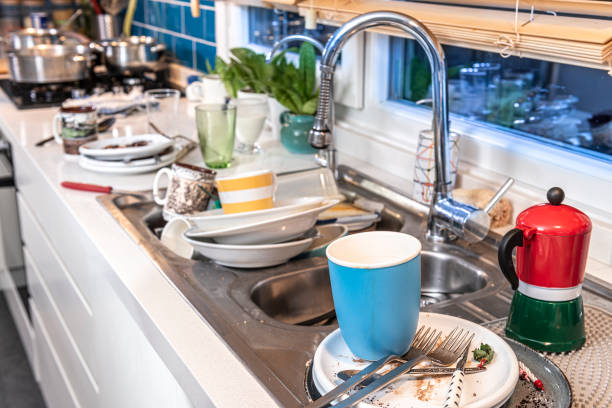 istock A filthy kitchen counter full of dishes after dinner. 1370575712