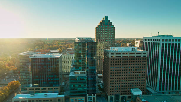 istock Downtown Raleigh Revealing Sun Setting Behind North Carolina Forest 1370580577