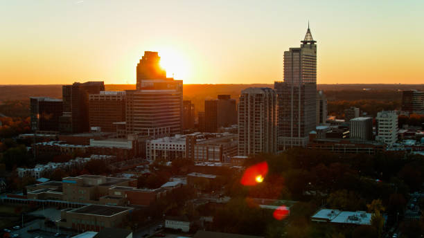 istock Sun Setting Behind Raleigh, NC - Aerial 1370580595