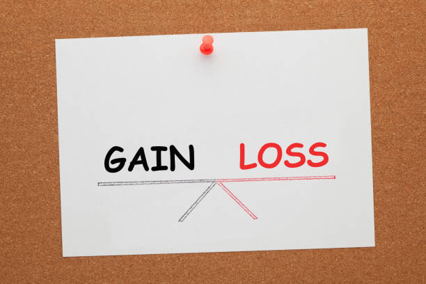 istock Gain and Loss Balance 1370581097