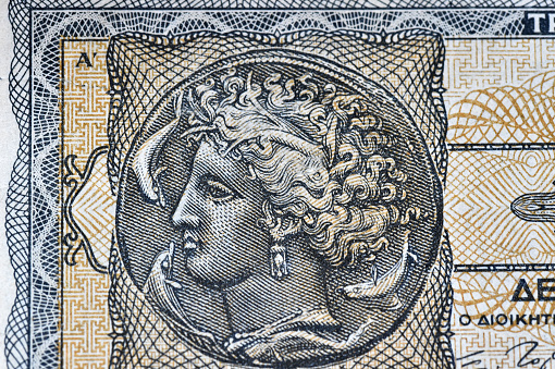 a portrait of Athena on a Greek banknote