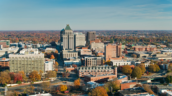 Aerial  shot of Greensboro, North Carolina on a sunny day in Fall.