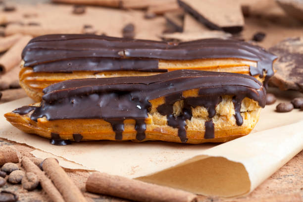 istock chocolate-covered custard eclair with creamy chocolate cream 1370585003