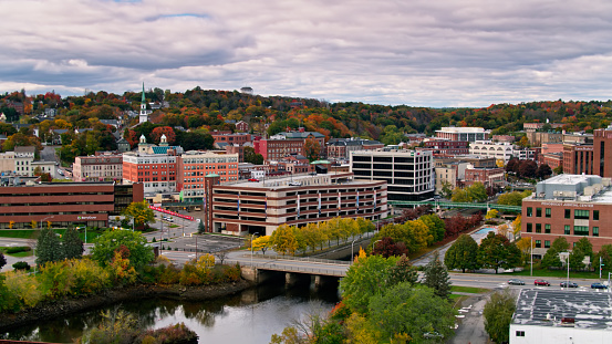 Aerial shot of Bangor, Maine on a cloudy day in Fall.