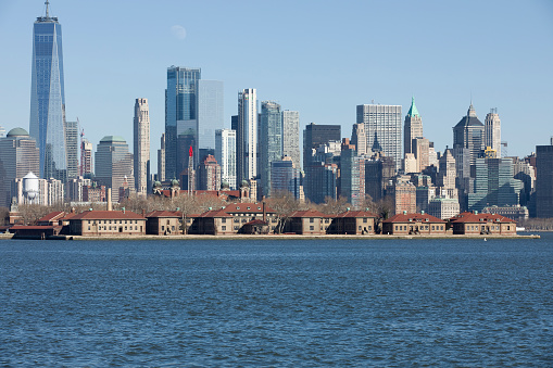 View of the back of Ellis Island National Landmark in foreground, from Liberty State Park Jersey City New Jersey.