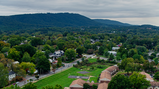 Aerial shot of Charlottesville, Virginia on a cloudy afternoon in early Fall.
