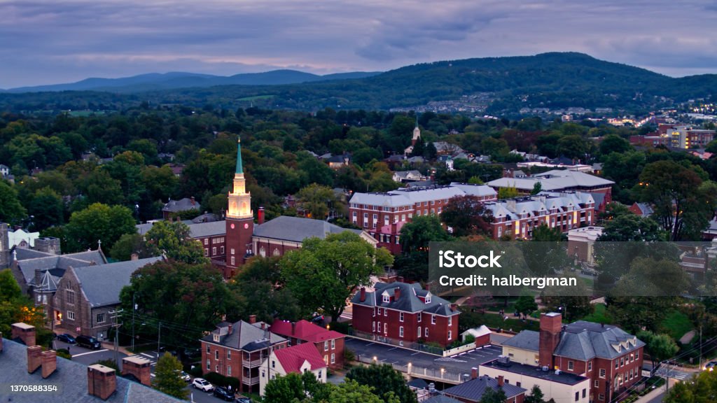 High Aerial Shot of Downtown Charlottesville, Virginia with Market Street Park Aerial shots of Charlottesville, Virginia on a cloudy evening in early Fall. Virginia - US State Stock Photo