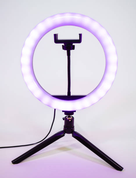 istock Ring lamp on a small tripod. Purple light. 1370589322