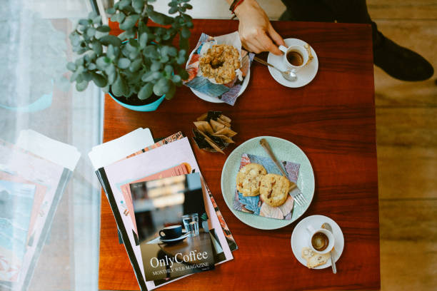 istock Coffee and sweets on the table in the cafe 1370589334