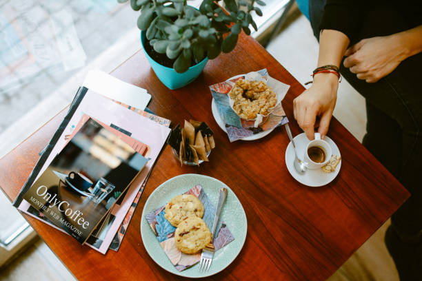 istock People relaxing in the cafe 1370591370