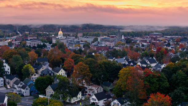 Aerial of Residential Community in Concord, New Hampshire with State House in Distance Aerial shots of the New Hampshire State House in Concord at sunrise on a misty morning in Fall.  

Authorization was obtained from the FAA for this operation in restricted airspace. new hampshire stock pictures, royalty-free photos & images