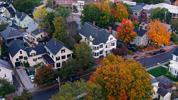 Shot of Residential Community in Concord, New Hampshire- Overhead Aerial Aerial shots of houses in Concord at sunrise on a misty morning in Fall.  

Authorization was obtained from the FAA for this operation in restricted airspace. concord new hampshire stock pictures, royalty-free photos & images