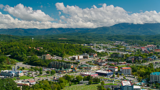 Aerial shot of Pigeon Forge, a popular vacation destination in Sevier County, Tennessee, close to Great Smoky Mountains National Park.