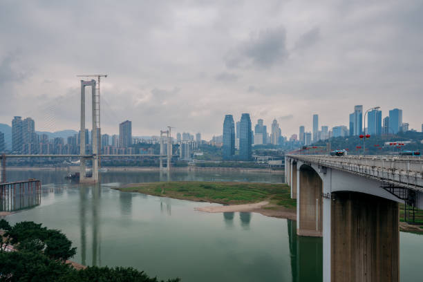 istock Cloudy days in Chongqing riverside city skyline 1370595001