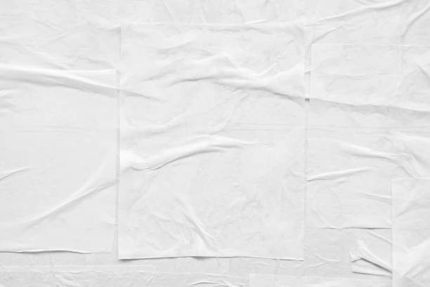 istock Blank white crumpled and creased paper poster texture 1370595283