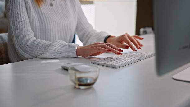 istock Young woman working at home in COVID-19 lockdown. 1370595608