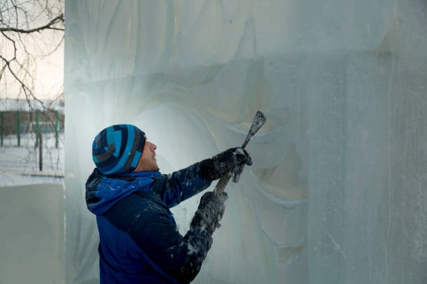 istock Portrait of a sculptor with a chisel in his hands 1370600363