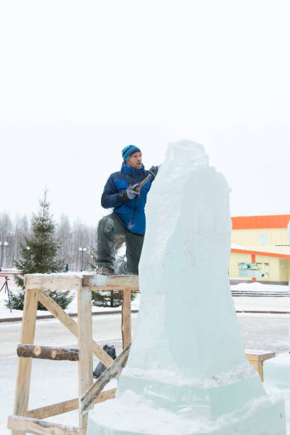 istock Portrait of a sculptor at work on a figure 1370602301