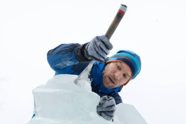 istock Portrait of a sculptor at work on a figure 1370602318