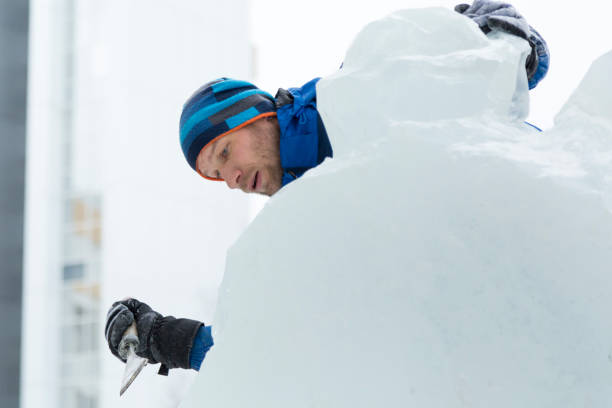 istock Portrait of a sculptor at work on a figure 1370602429