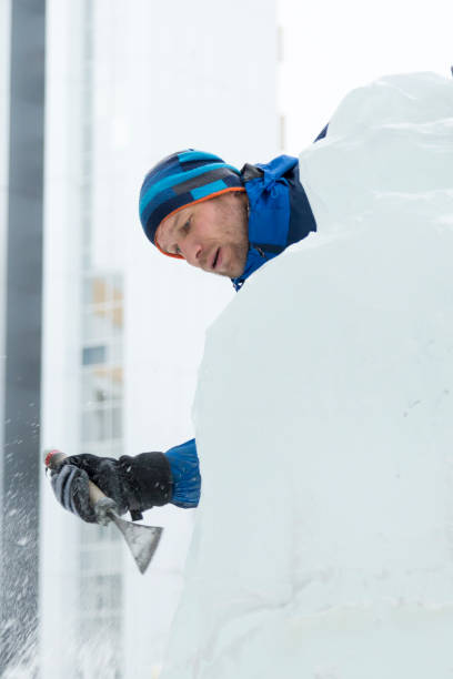 istock Portrait of a sculptor at work on a figure 1370602449