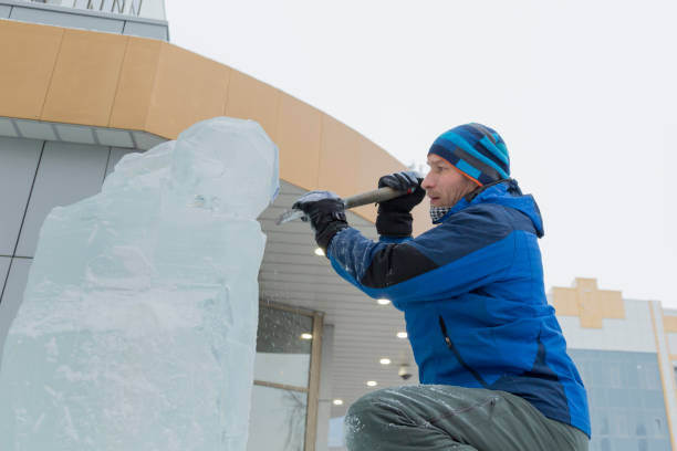 istock Portrait of a sculptor at work on a figure 1370602510