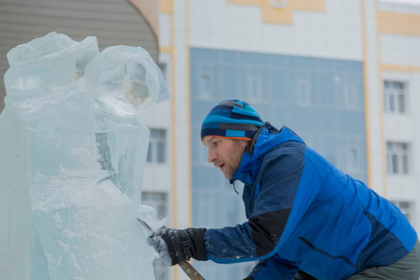 istock Portrait of a sculptor at work on a figure 1370602519