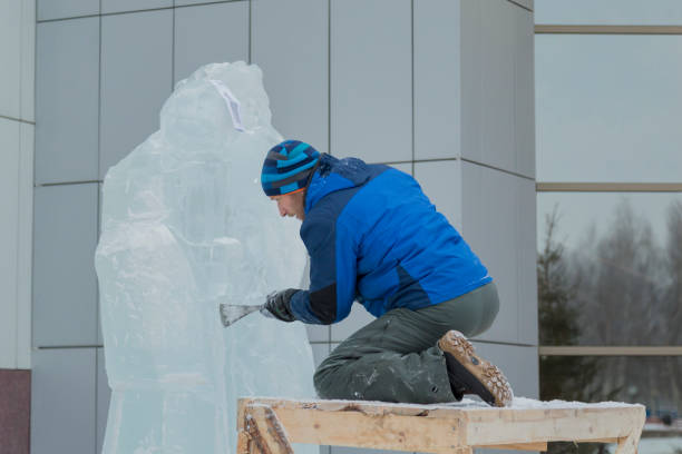 istock Portrait of a sculptor at work on a figure 1370602539