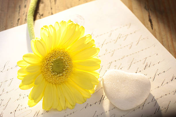 istock Stone heart with letter and flower 137060381