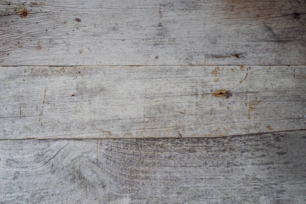 rustic weathered barn wood background with knots and nail holes - antique old fashioned close up color image imagens e fotografias de stock