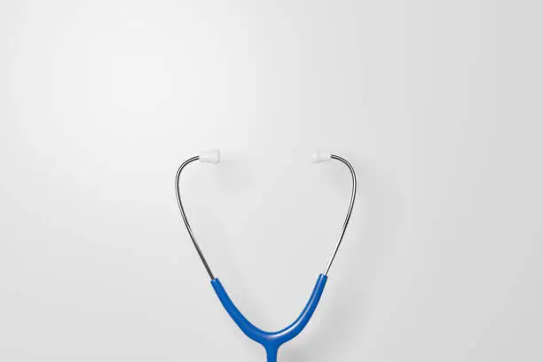 Photo of Blue stethoscope on white background. Healthcare medical, Insurance for your health concept. 3d render illustration
