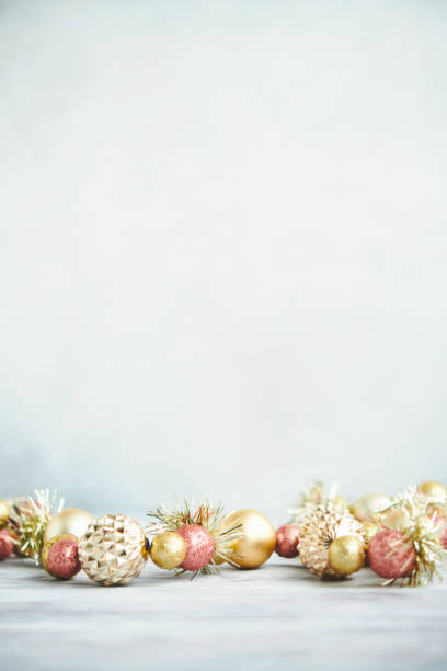 istock Christmas background with rose gold and gold decorations and copy space 1370608402