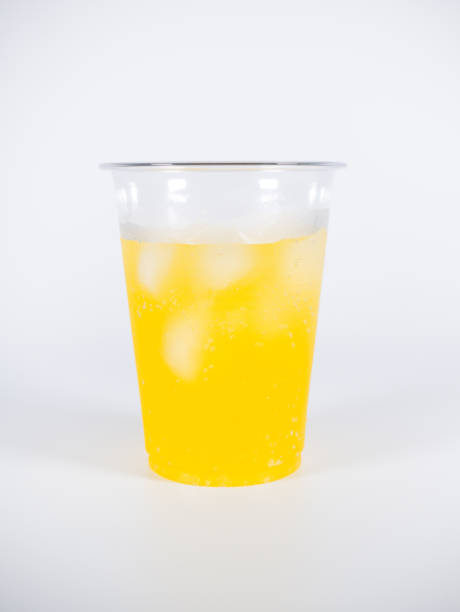 istock Orange soda Plastic cup, close up photo 1370616718