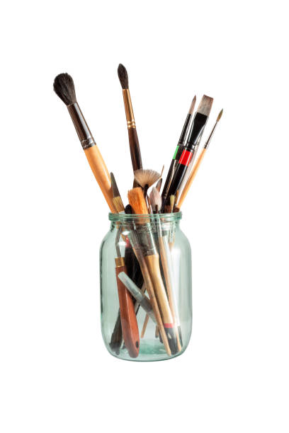 istock Glass Jar with Brushes and Other Painting Tools. File With Clipping Path. 1370619481