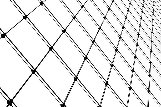 Glass wall The modern architecture of the outer surface, the glass wall. window grid patterns stock pictures, royalty-free photos & images