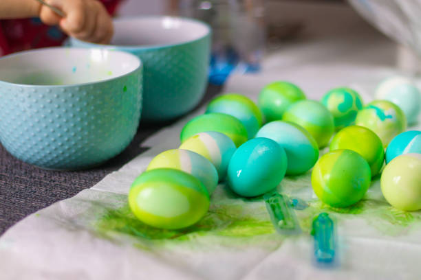 Easter blue and green eggs after coloring with dyes for the Easter holiday.
