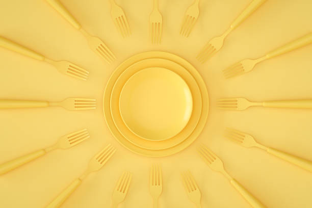 istock Minimal restaurant food concept kitchen utensils yellow background 1370634520