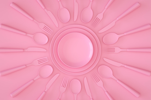 Minimal kitchen restaurant concept with kitchen utensils on pink background.